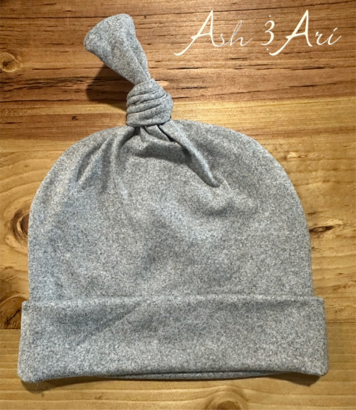Top knotted beanie