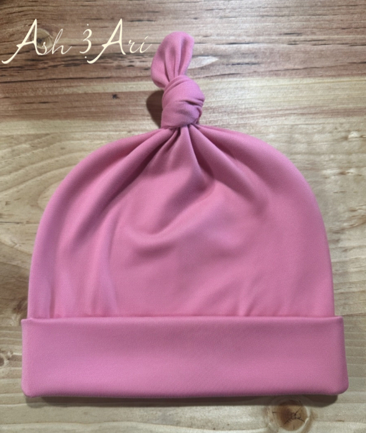 Top knotted beanie