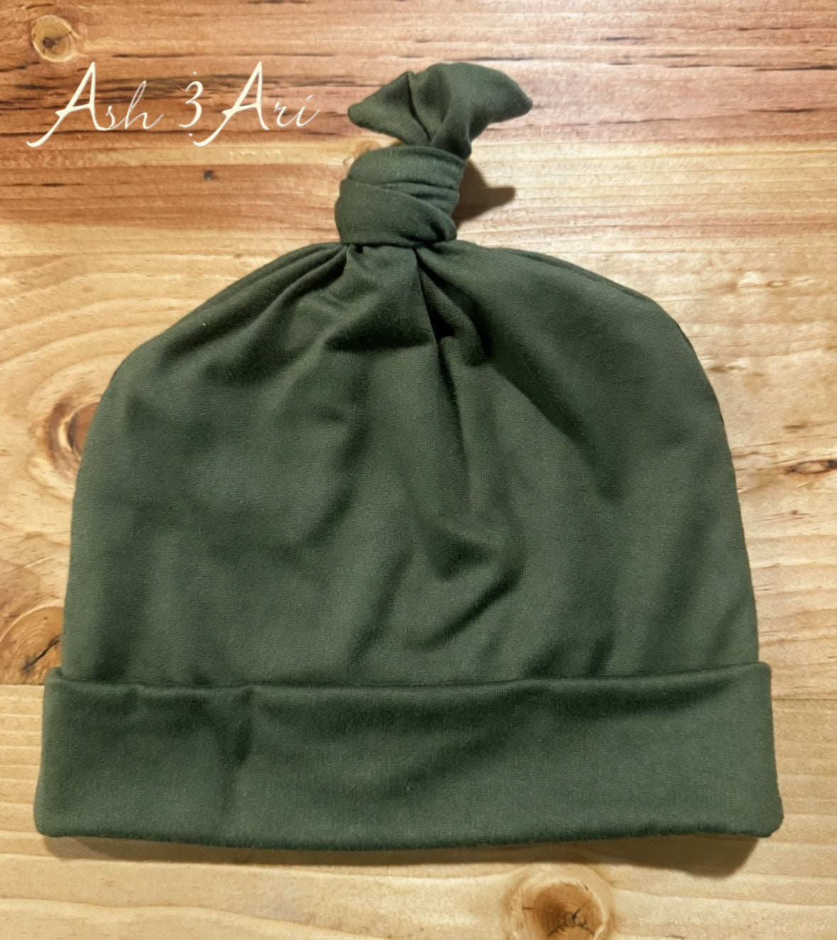 Top knotted beanie